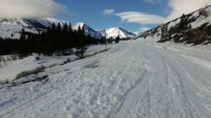 A VL Road Towards Mountains Covered in Snow