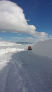 Clearing snow east of lower parking lot