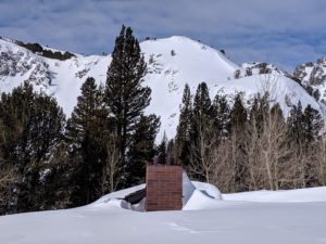 Big V Restroom in the Middle of a Snow Covered Plain