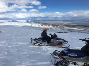 A Man on a Motor Snow Bike on SNow