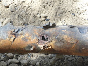 Hole in old pipe near top of Pinecrest