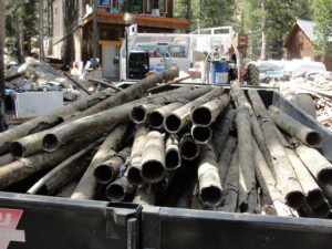 closeup shot of lots of old pipes in a container