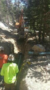 two men working at the pipeline project