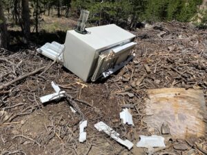 Dumped refrigerator at gravel pit