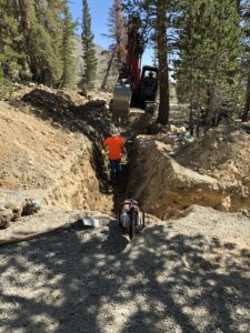 view of a man monitoring an excavation work