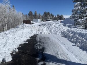 A Lower Parking Lot With Snow Covered Plain