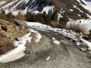 Big V roadway near boat ramp with snow