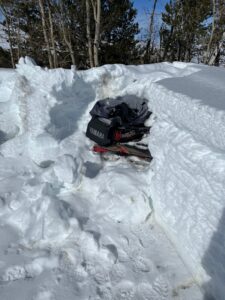 Hit snowmobile and trailer in the snow