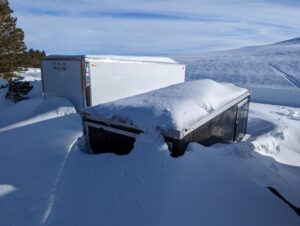 view of the snow covered Storage trailers