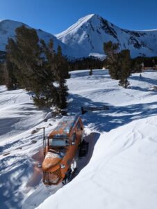 aerial view of a truck in the snow