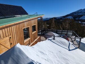 view of the snow beside a house