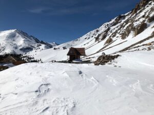 view of the hut in the snow area