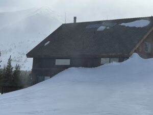 Snow View of the Rear of cabin on Summit