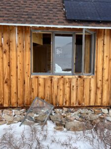 Wind damage to Summit cabin windows