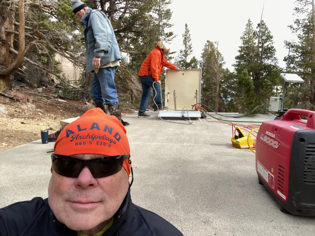 men working on low tank