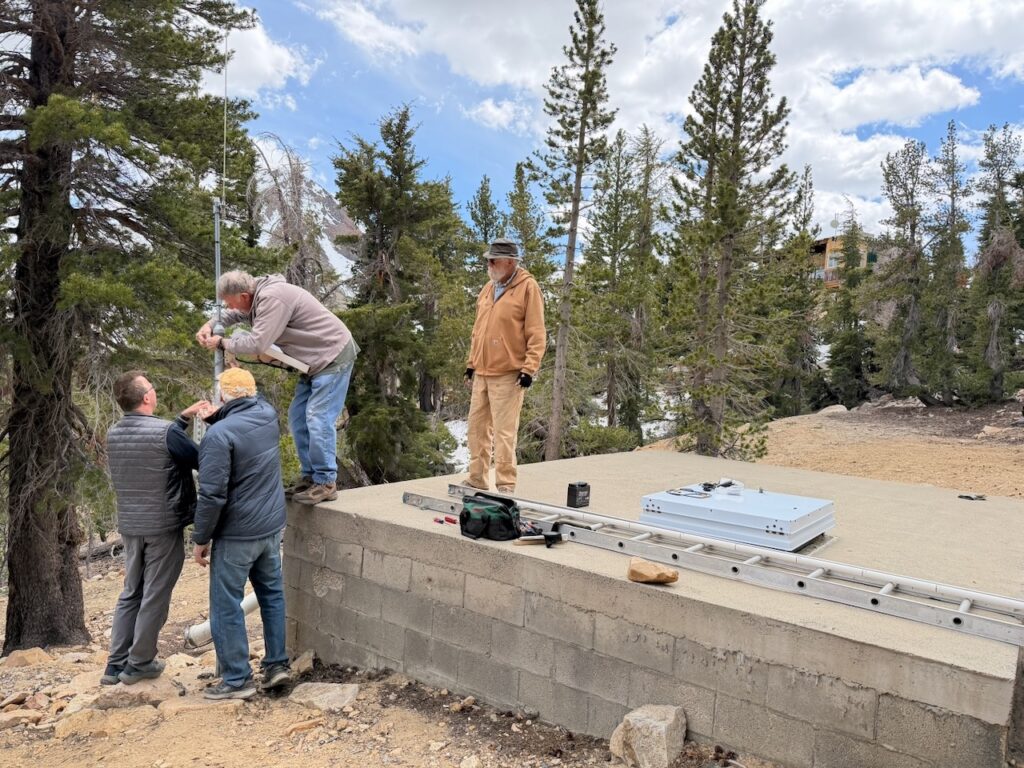 The startup team setting up the lower tank