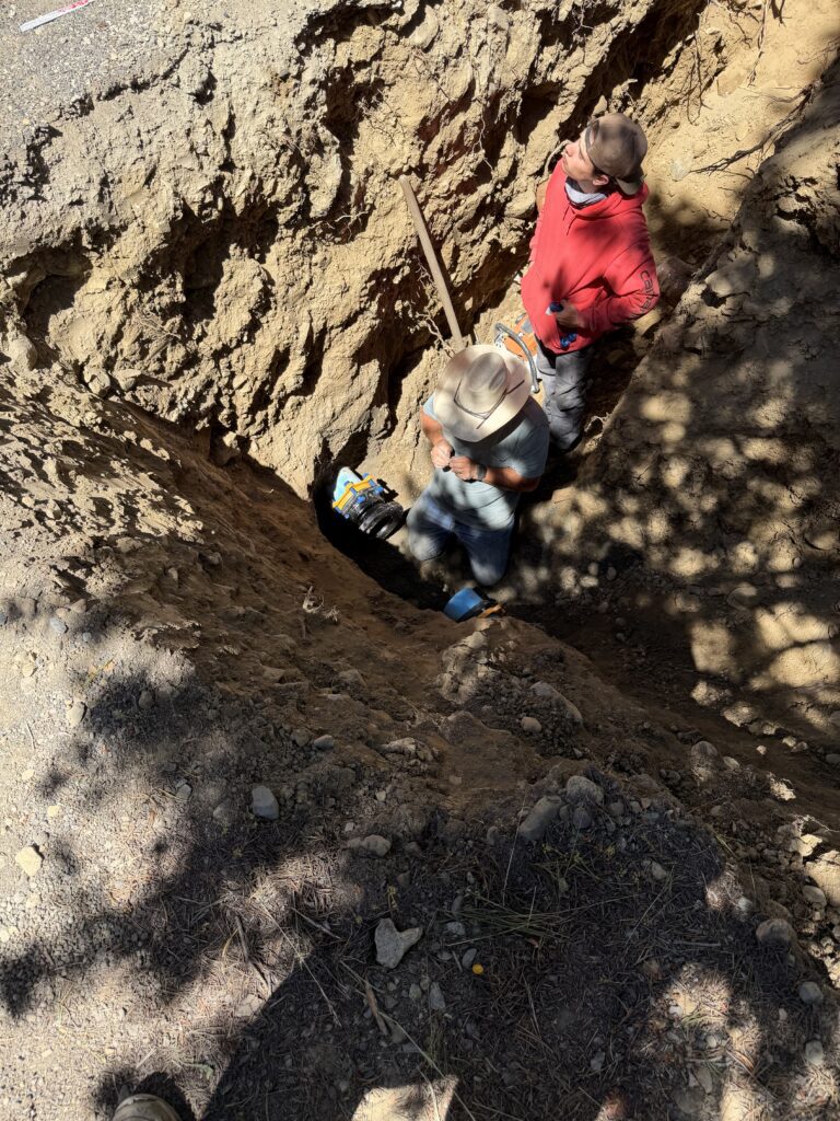 Workers replacing the valve